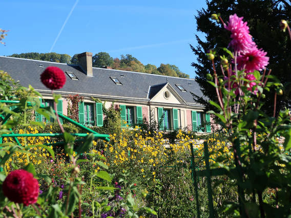 Monet's house nestled in amongst the Autumn blooms